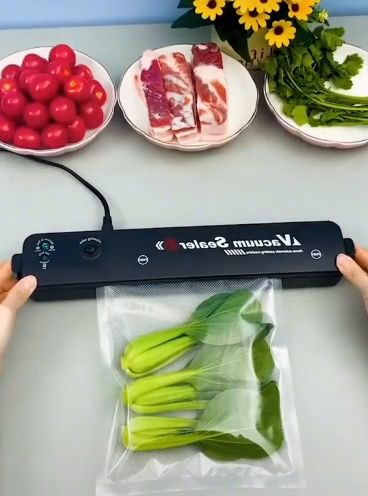 دستگاه وکیوم و پرس کیسه مواد غذایی Vacuum Sealer مدل 37 سانتی‌متری